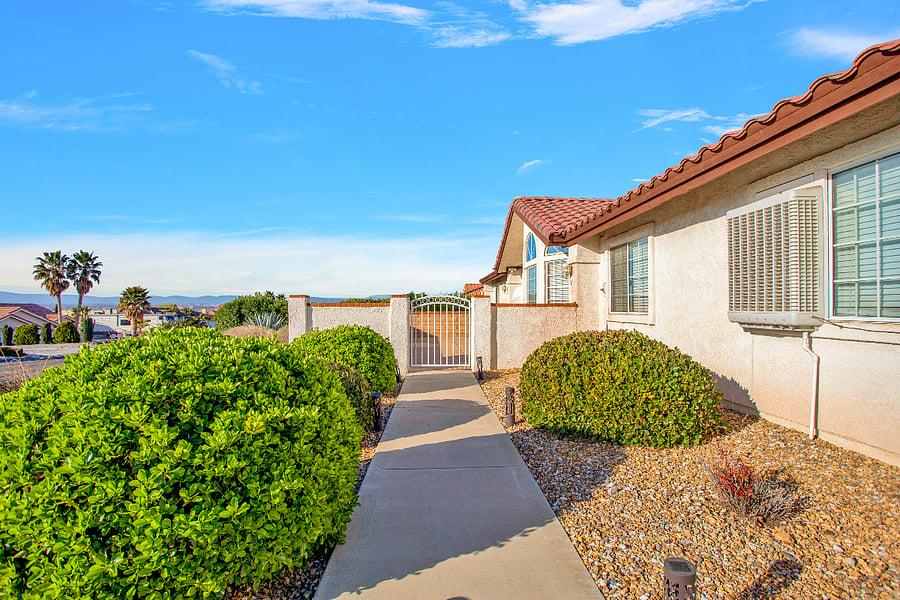 Walkway to front door and enclosed courtyard