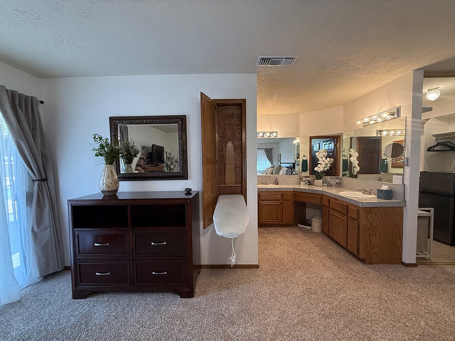 Bedroom 3: ironing board, double vanity sink