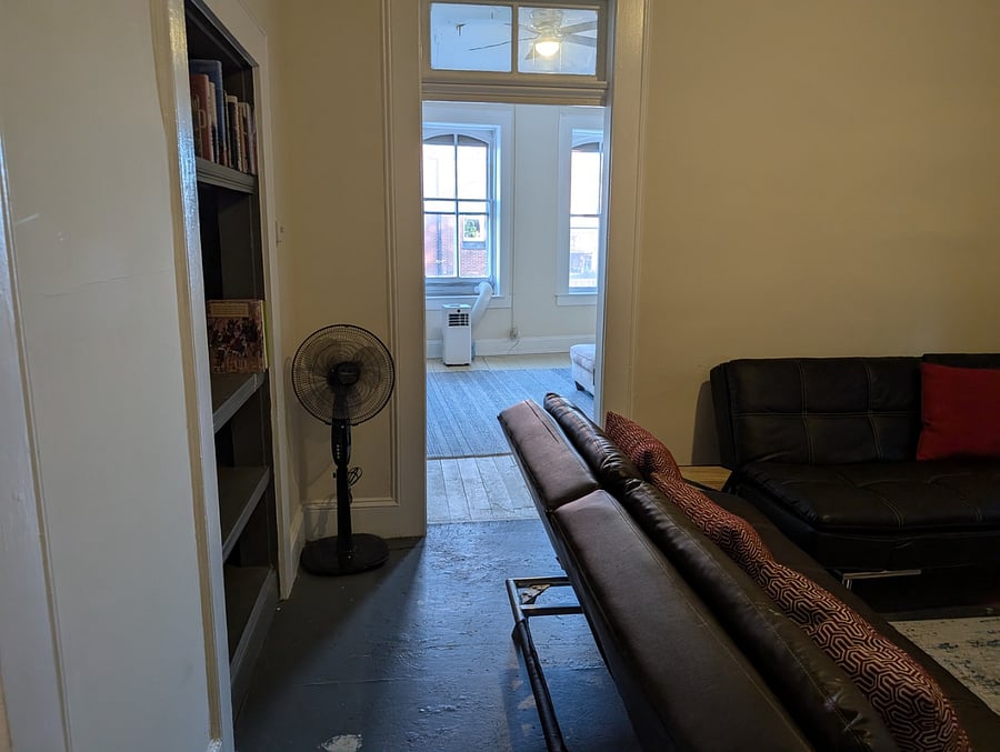 Sitting room / fold out beds and king bedroom entrance