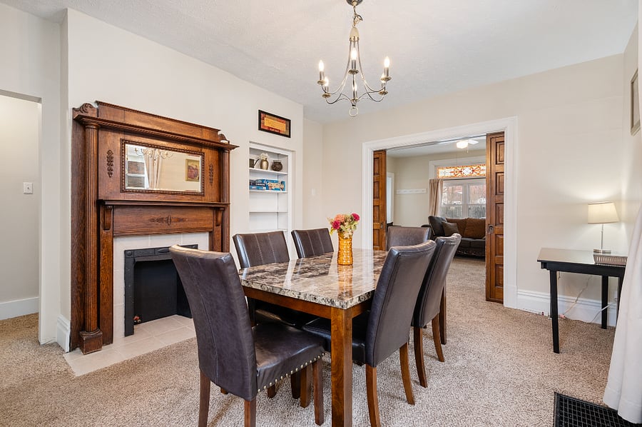 Comfortable dining space for meals or extra workspace.