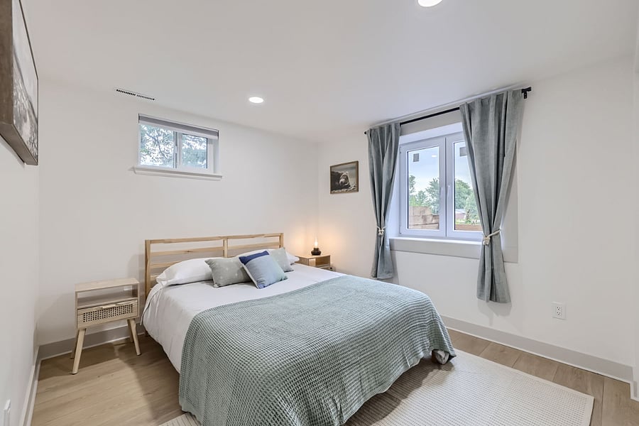 Bedroom-Blackout Curtains, Closet, and Two Nightstands. Full Egress** European Tilt & Turn Window