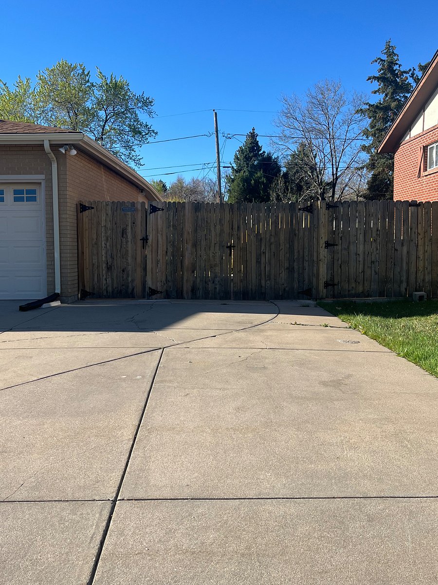 Large off street parking-Entry through gate walk alongside garage to shared patio area where your access via garage is private into house.