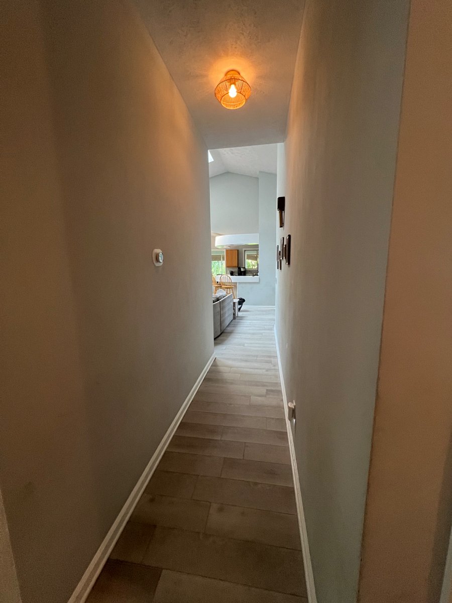 hallway to the back bedrooms and bathrooms