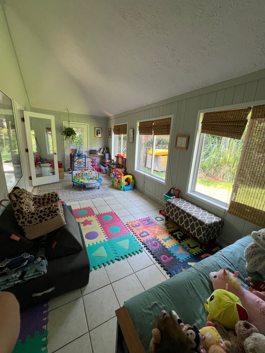 playroom/sunroom which can also be converted into a workspace.