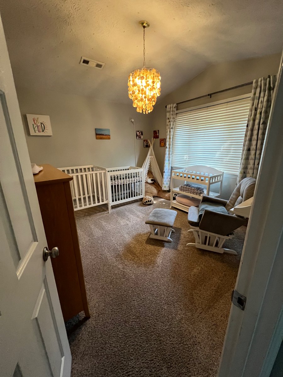 bedroom #3 currently has 2 cribs (1 regular and 1 mini)