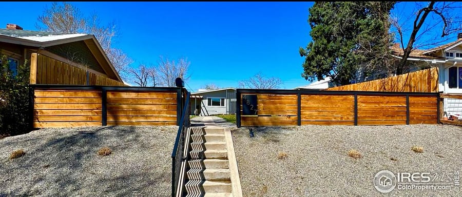 Front gate entrance with stairs