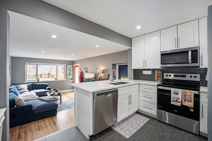 Kitchen with view into living room