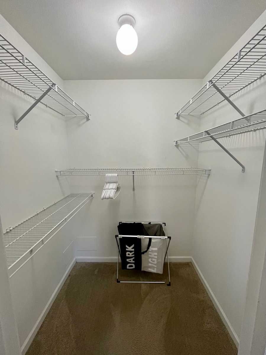 primary bedroom walk-in closet