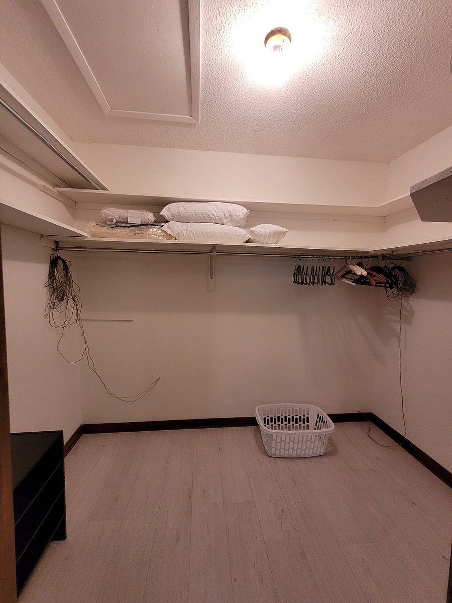 Walk-in closet. Downstairs.