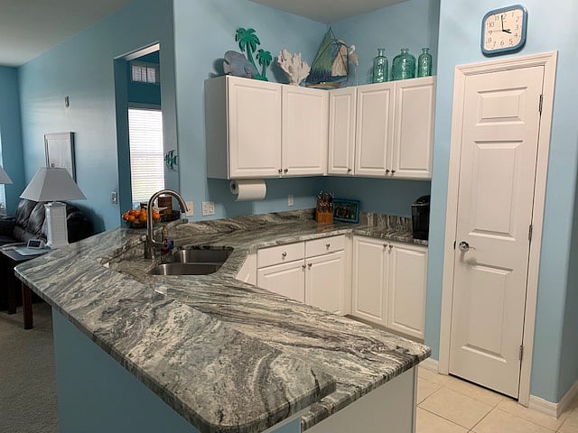 Fully equipped kitchen with granite countertops 