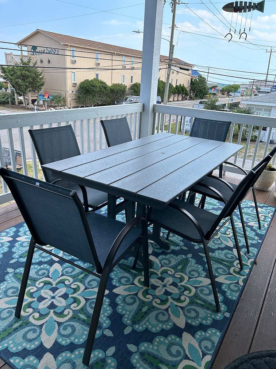 Outside dining table off 2nd floor deck.