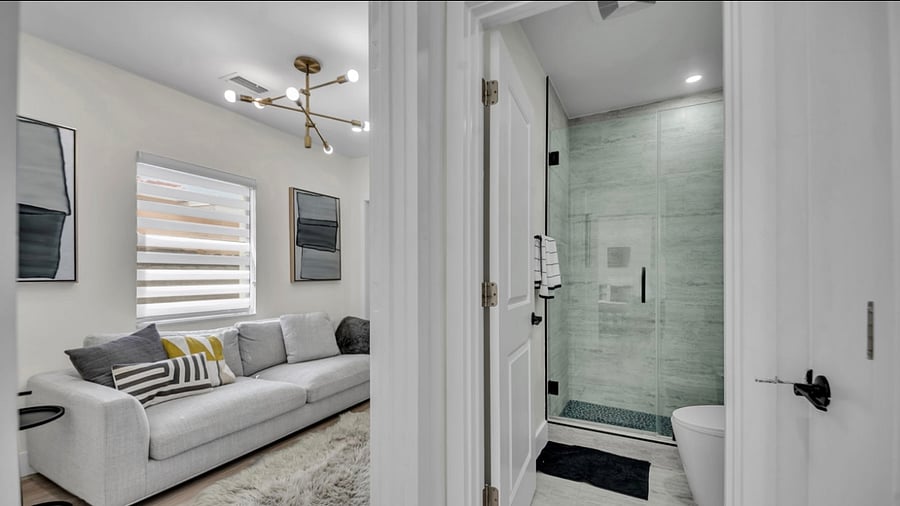 Bathroom 1 with view of TV room - no pull out bed