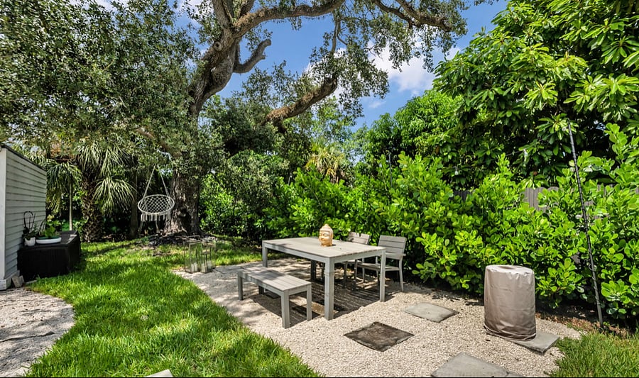 Backyard - Large tree with swing and patio table