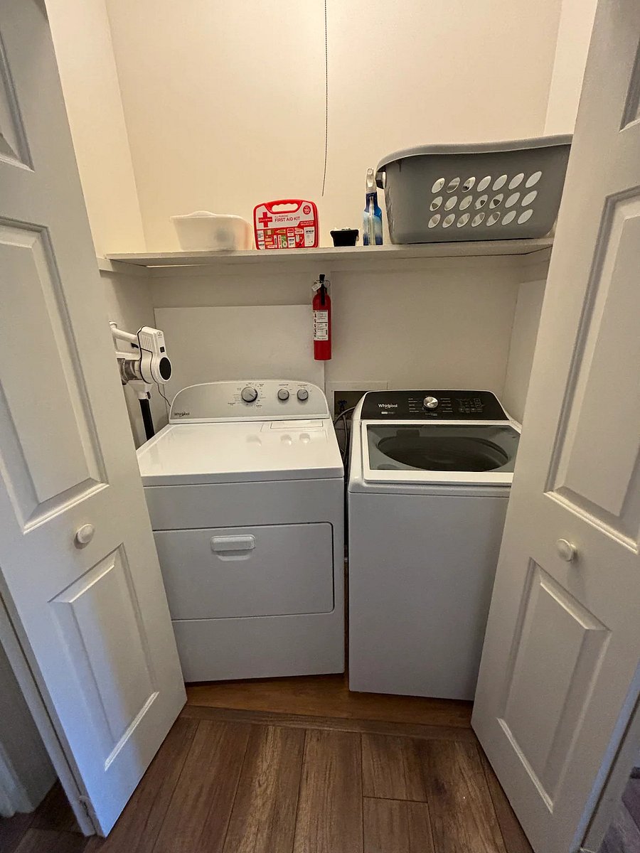 Laundry facilities off of hallway.