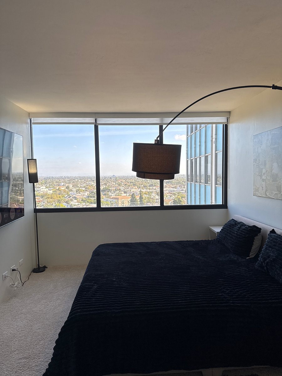 King-size bed with city views or pull the shades.