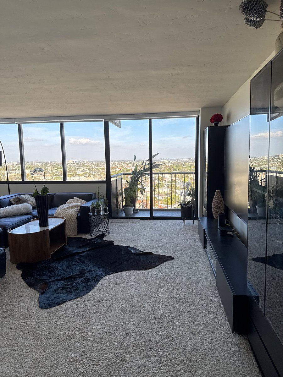 Overlooking the balcony with views of the city and ocean.