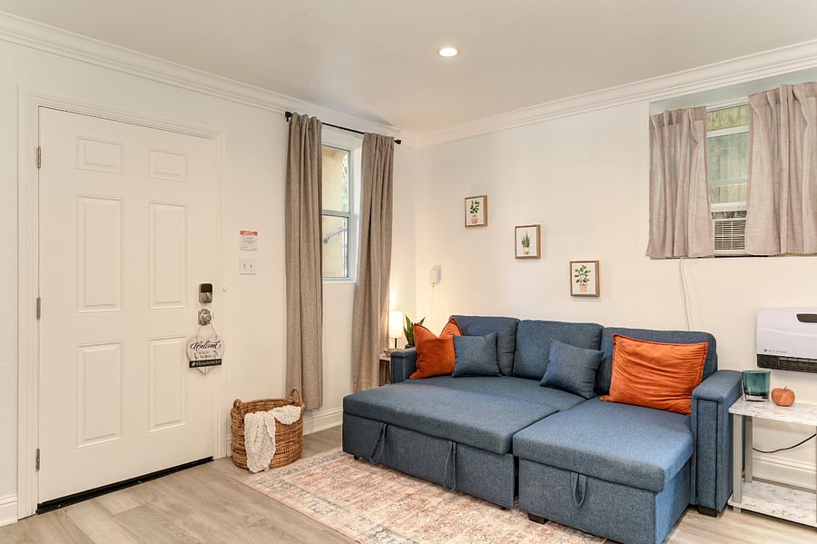 this plush, inviting couch isn't just for loungingit easily transforms into a comfy queen bed when needed, offering flexibility for guests or family. Its the thoughtful touch that adds warmth, making the space feel like a true home away from home.