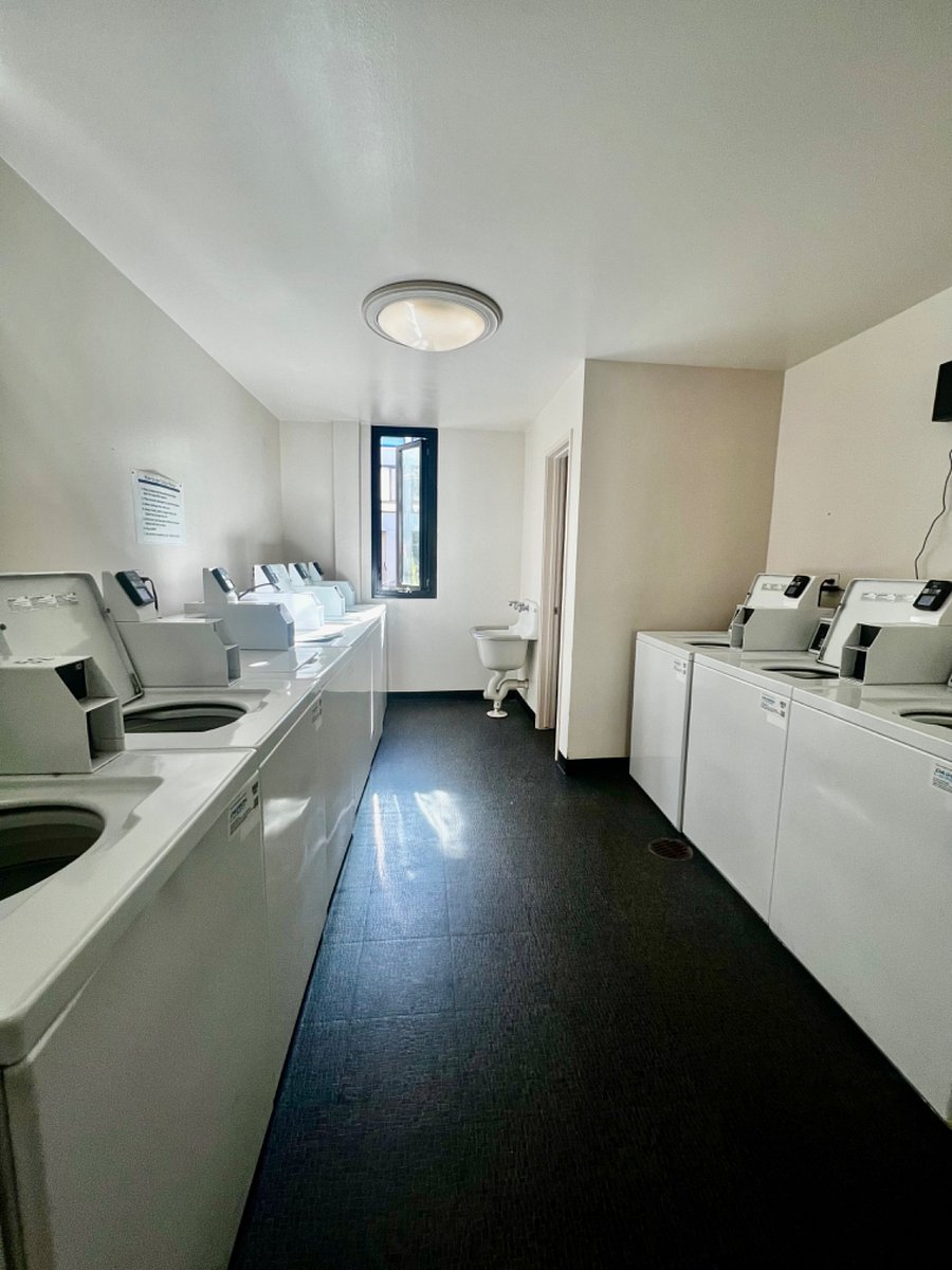 Washers and dryers located on same floor as studio.