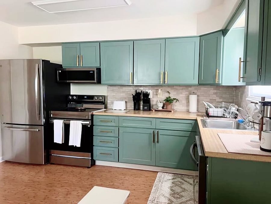 Full kitchen equipped with fridge, stove, oven, microwave, dishwasher, dishes, utensils, pots and pans. 
