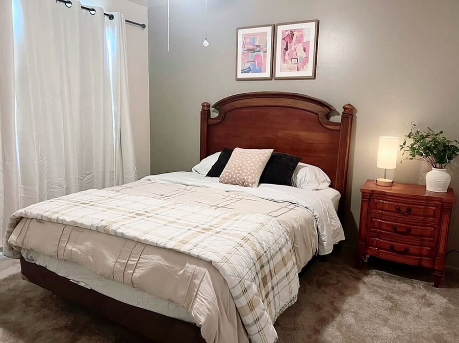Bedroom 3 equipped with Roku TV and Memory Foam Mattress. Side table with charging lamp. Closet in room 