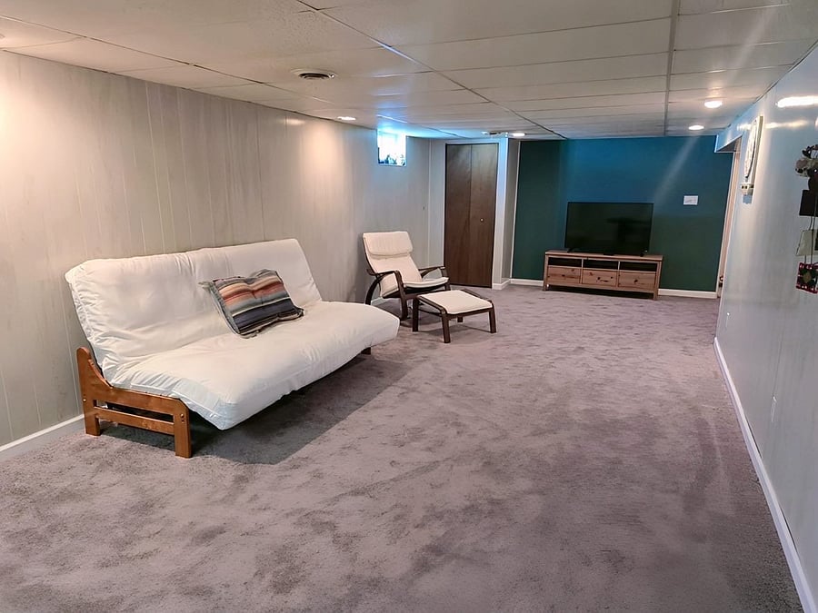 Full Basement equipped with Roku TV and Memory Foam Futon that turns into another bed to sleep. 