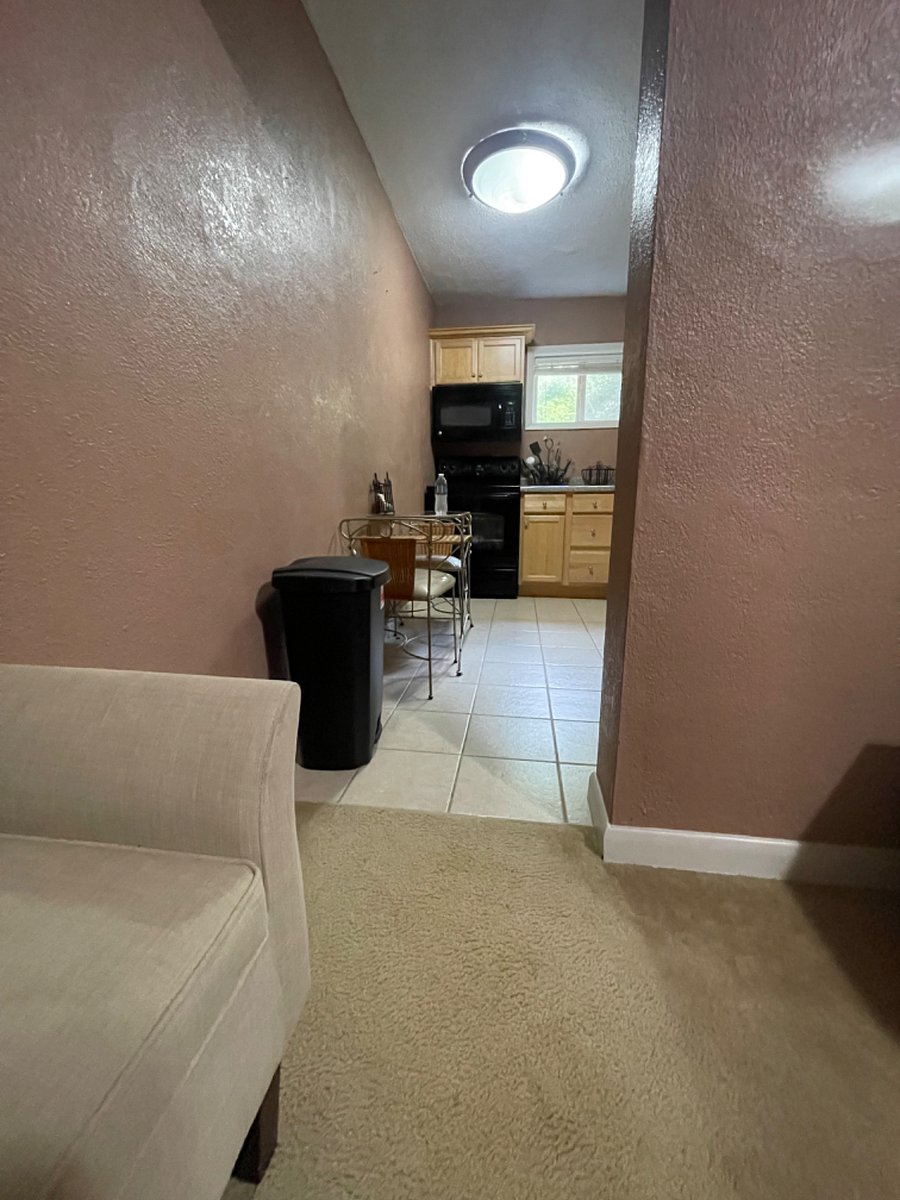 Fully equipped eat-in kitchen.