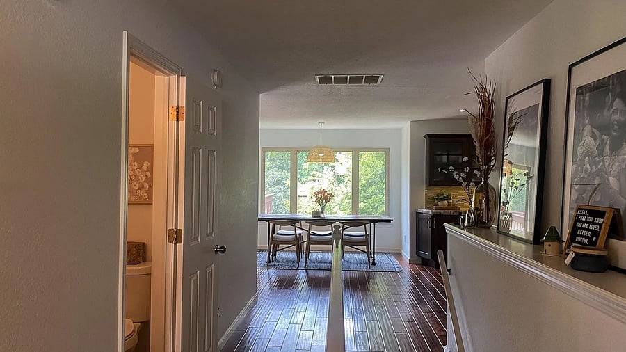 Upon entrance, garage door to right, living room access on left, half bathroom on left, kitchen straight ahead, and stairs to access all bedrooms and full bathrooms downstairs.