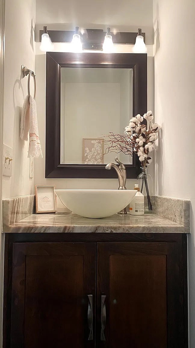 Upstairs half bathroom.