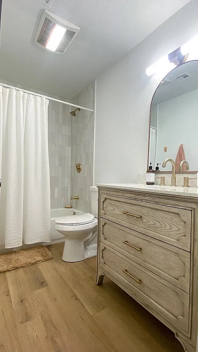 Guest bathroom with tub.