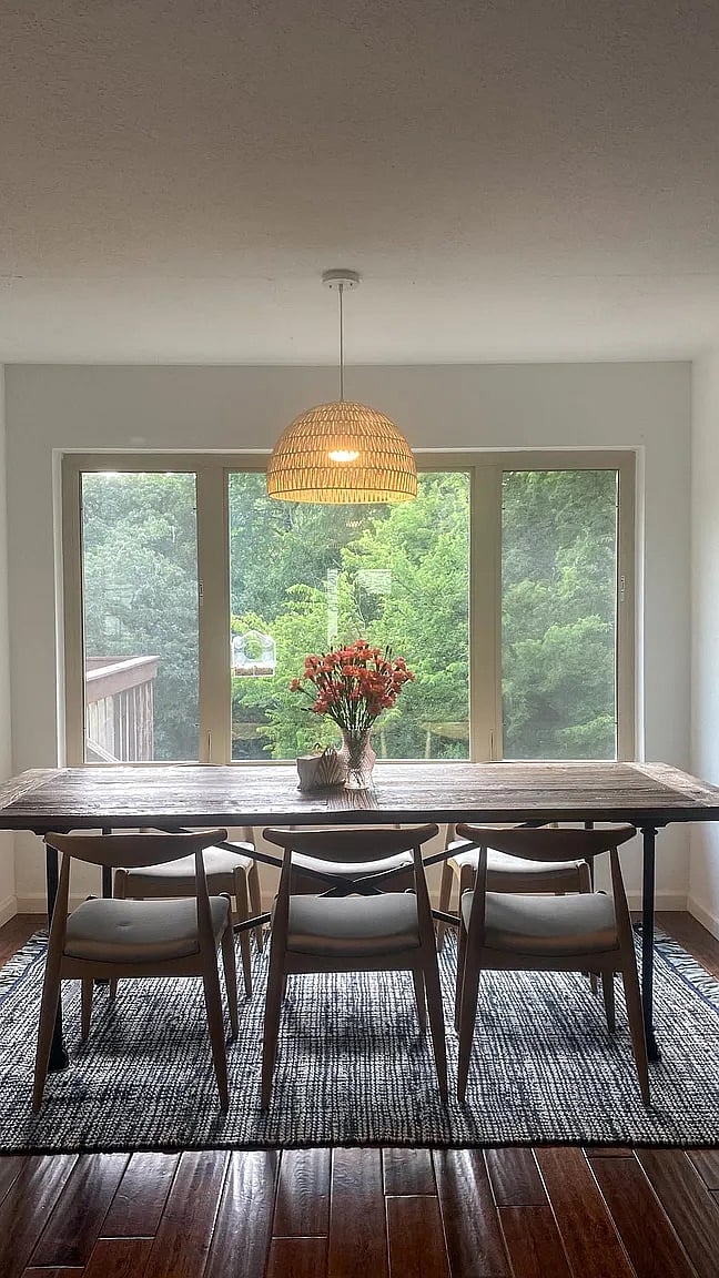 Dining table with incredible views of the nature trail.