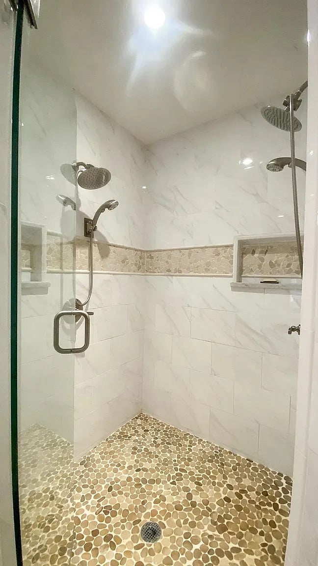 Primary Suite walk in shower.