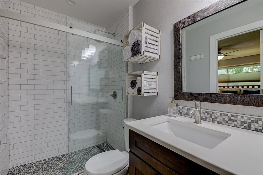 Master bathroom with walk-in shower.