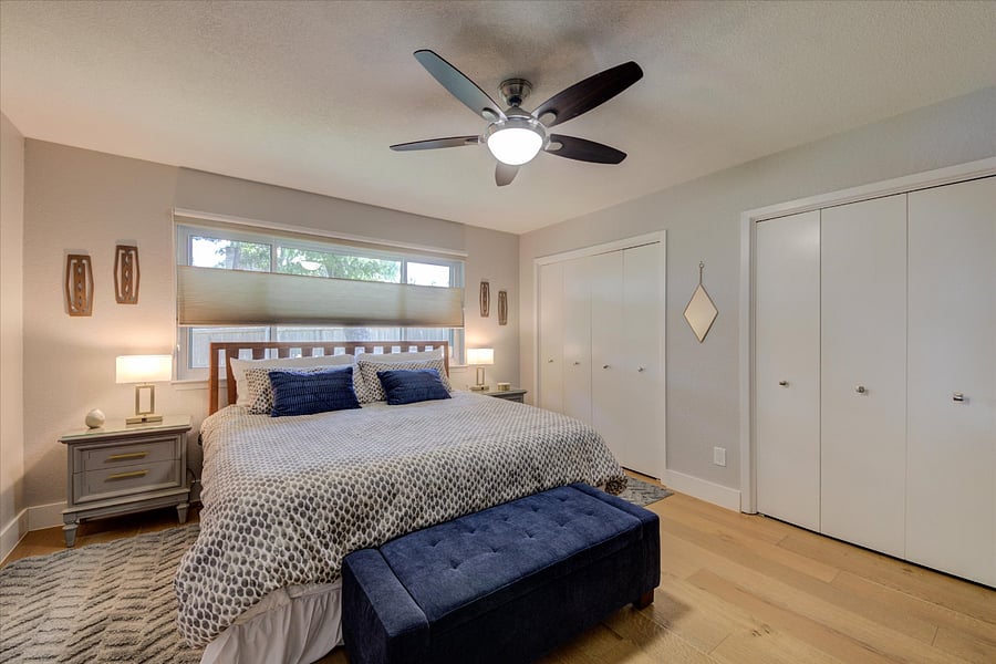 Master Bedroom Features King Bed, room darkening shade, honeycomb shades and is-suite full bathroom with walk-in shower and rain shower.