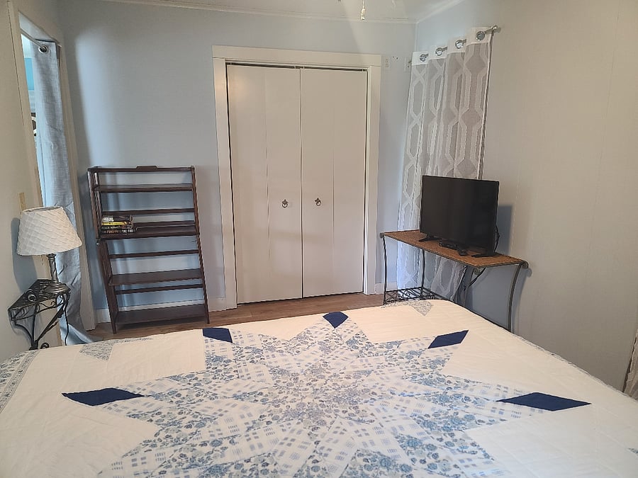 Please note that there is only a curtain at the doorway. This rental is for 1-2 people (with maybe a child or two). It affords some privacy, but understand that there is not a door to the bedroom. Closet is full sized and available for guests.