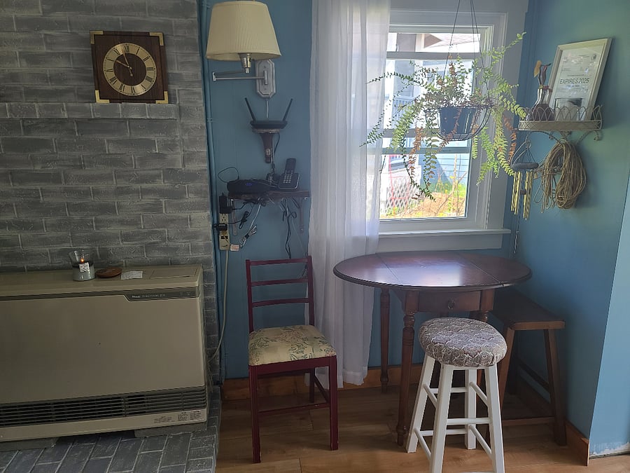 Small workspace and direct vent Rinnai propane heater.