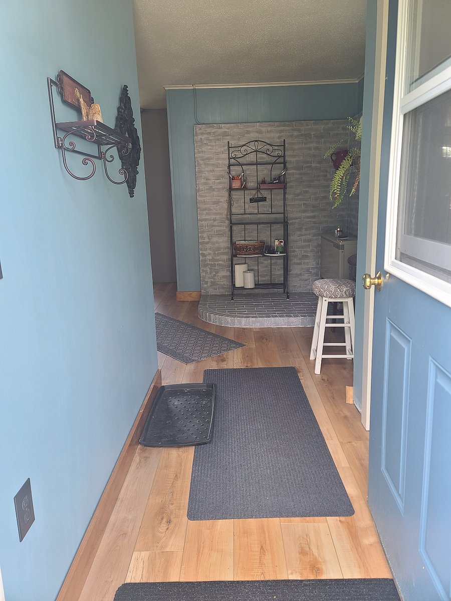 Entering through the front door. There is a closet to the right for jackets, bags, shoes, etc.