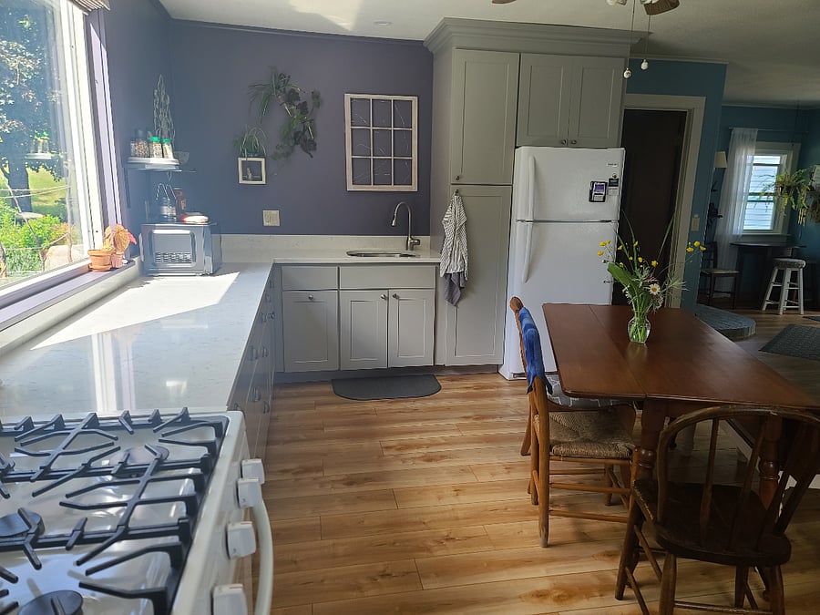 Kitchen area only 2 years old with beautiful granite countertops. Gas range and oven, microwave, toaster, and a small coffee maker as well as a french press. Full sized refrigerator. Easy wash up in the big kitchen sink (no dishwasher).