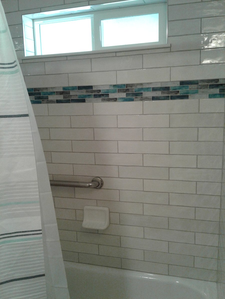 Beautiful tile for shower/tub combo. Even a window that slides open (with screen).