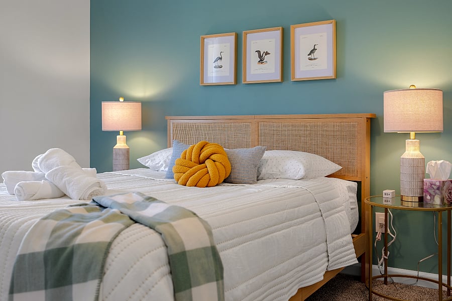 Queen bed with access the hall bathroom. Closet and dresser. Blackout curtains.