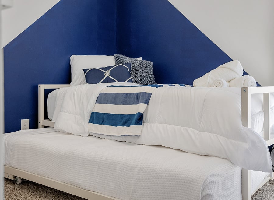 Trundle twin beds.  Closet. No dresser. Black out curtains.