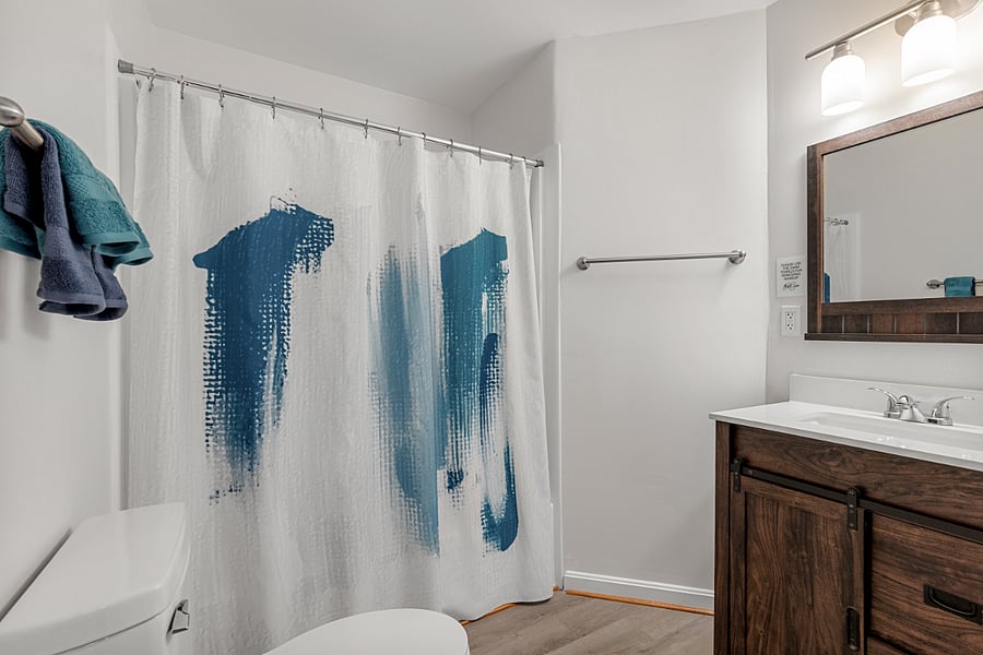 Hall bathroom with tub.