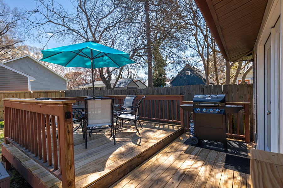 Deck.  Grill and dining table with seating for 6. 