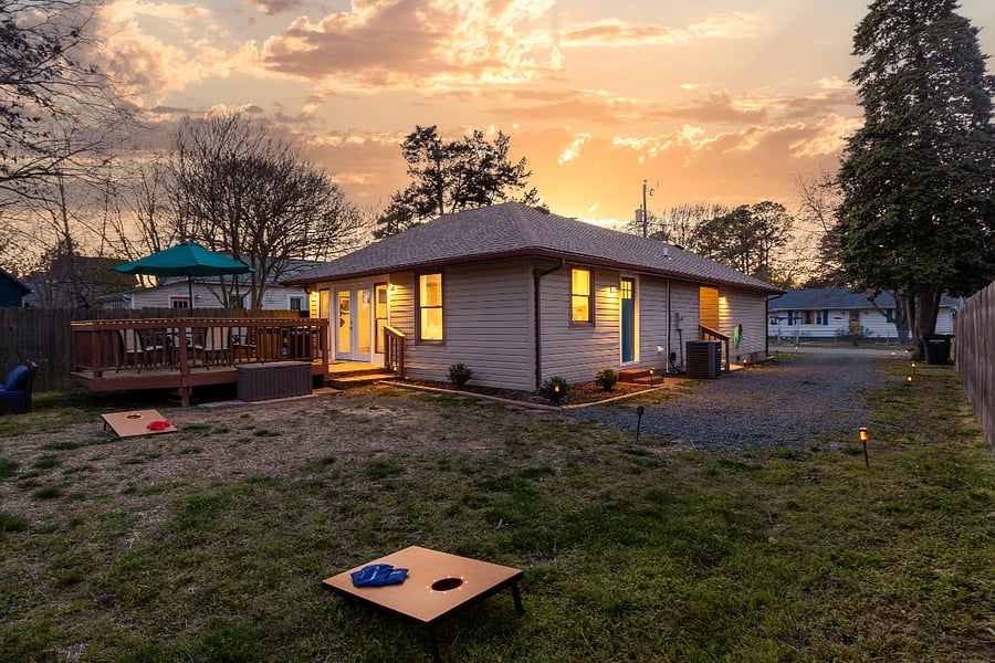 Enjoy a game of cornhole in our backyard.