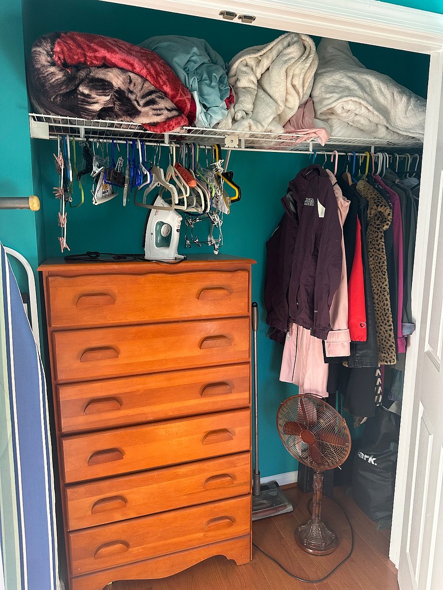 Closet in upstairs bedroom (will remove the clothes).