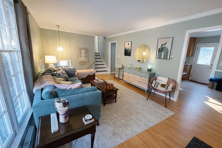 Main Floor Living Room with Wood Burning Stove and Keyboard (piano)