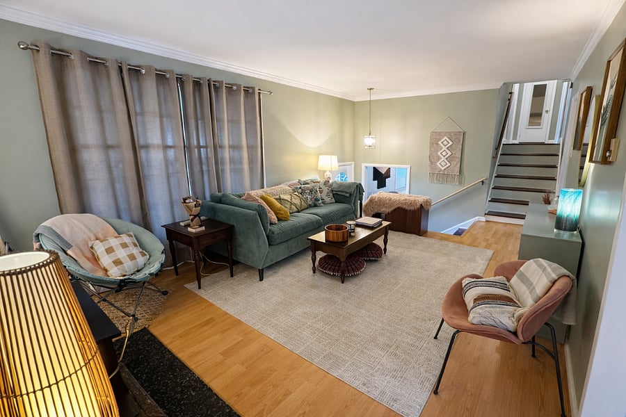 Main Floor Living Room with Wood Burning Stove and Keyboard (piano)