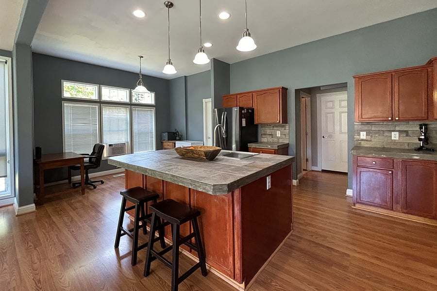 Kitchen with island and desk work station area
