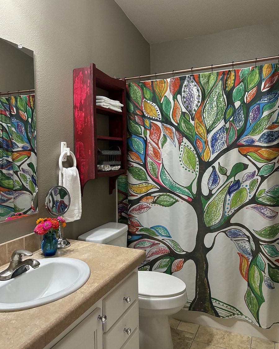 Second full bath with shower and tub. Between bedrooms 2 and 3.