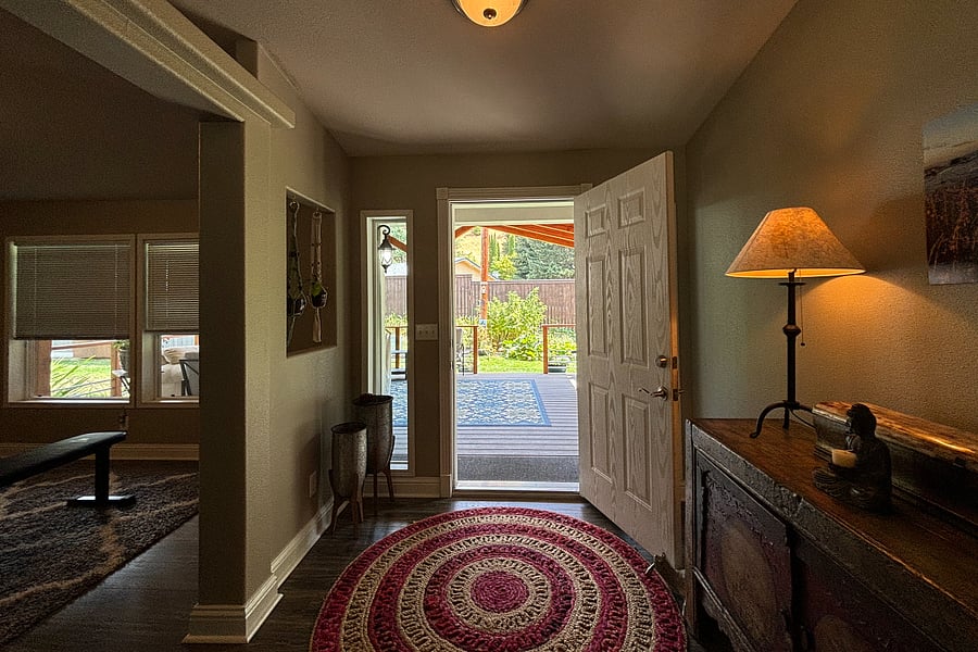 Back hallway leading to back porch and fenced back yard