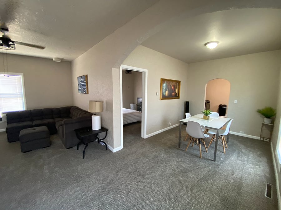 Main living area, dining, and primary bedroom
